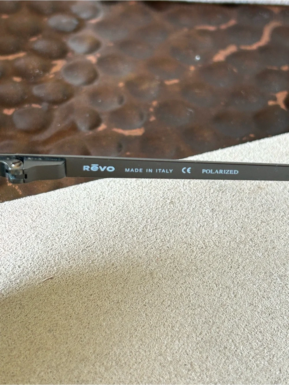Revo Polarized Sunglasses — Black Frame with Blue Logo